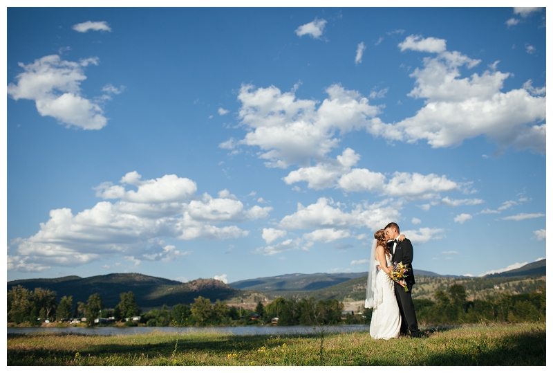 rainbows roosty kamloops wedding photo couple kissing